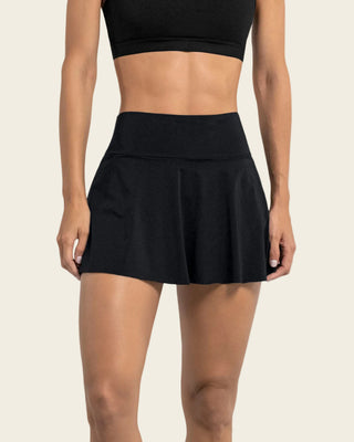 Enagua deportiva con short interno con bolsillo#color_700-negro