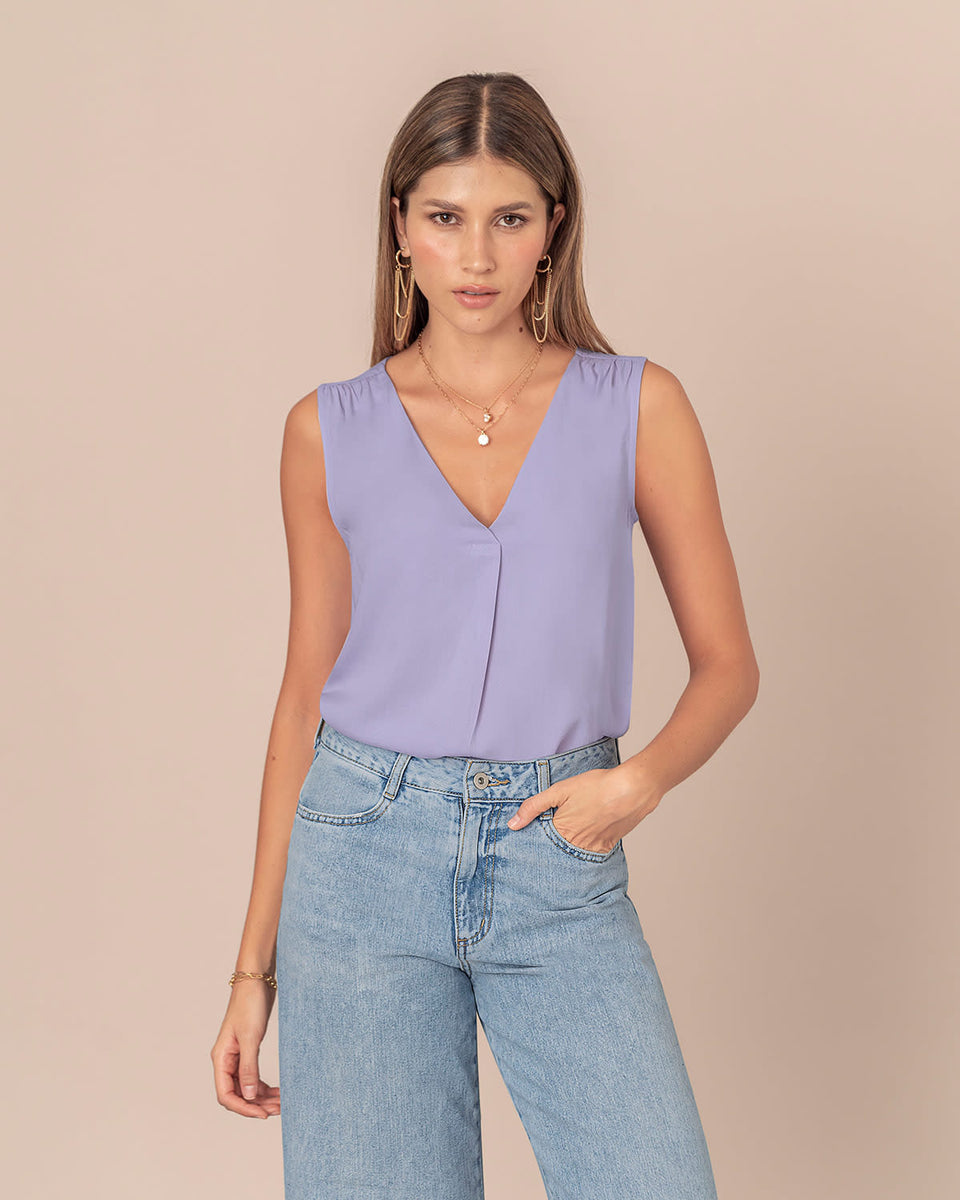 Blusa sin mangas escote en V con detalle sobrepuesto