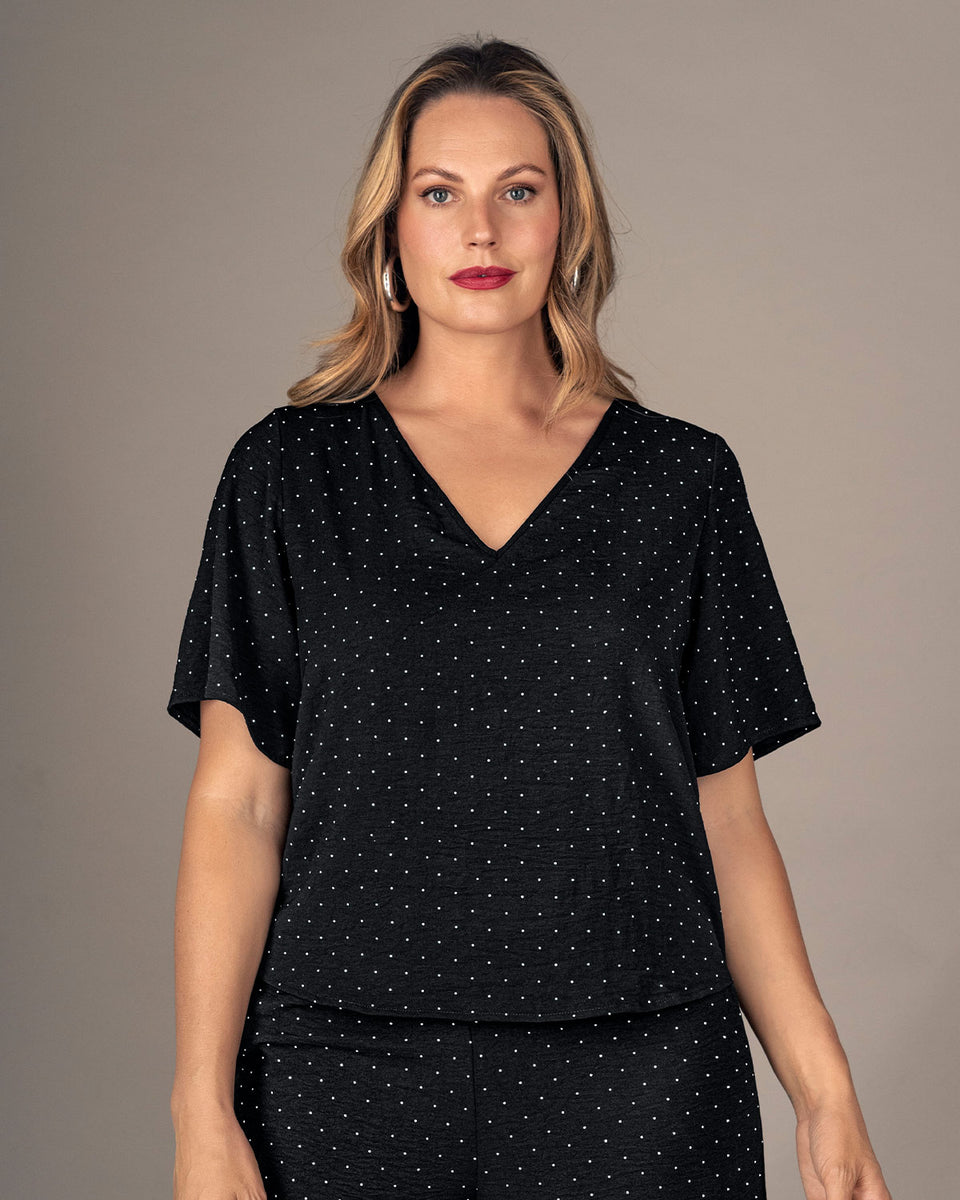 Blusa manga corta con apliques brillantes