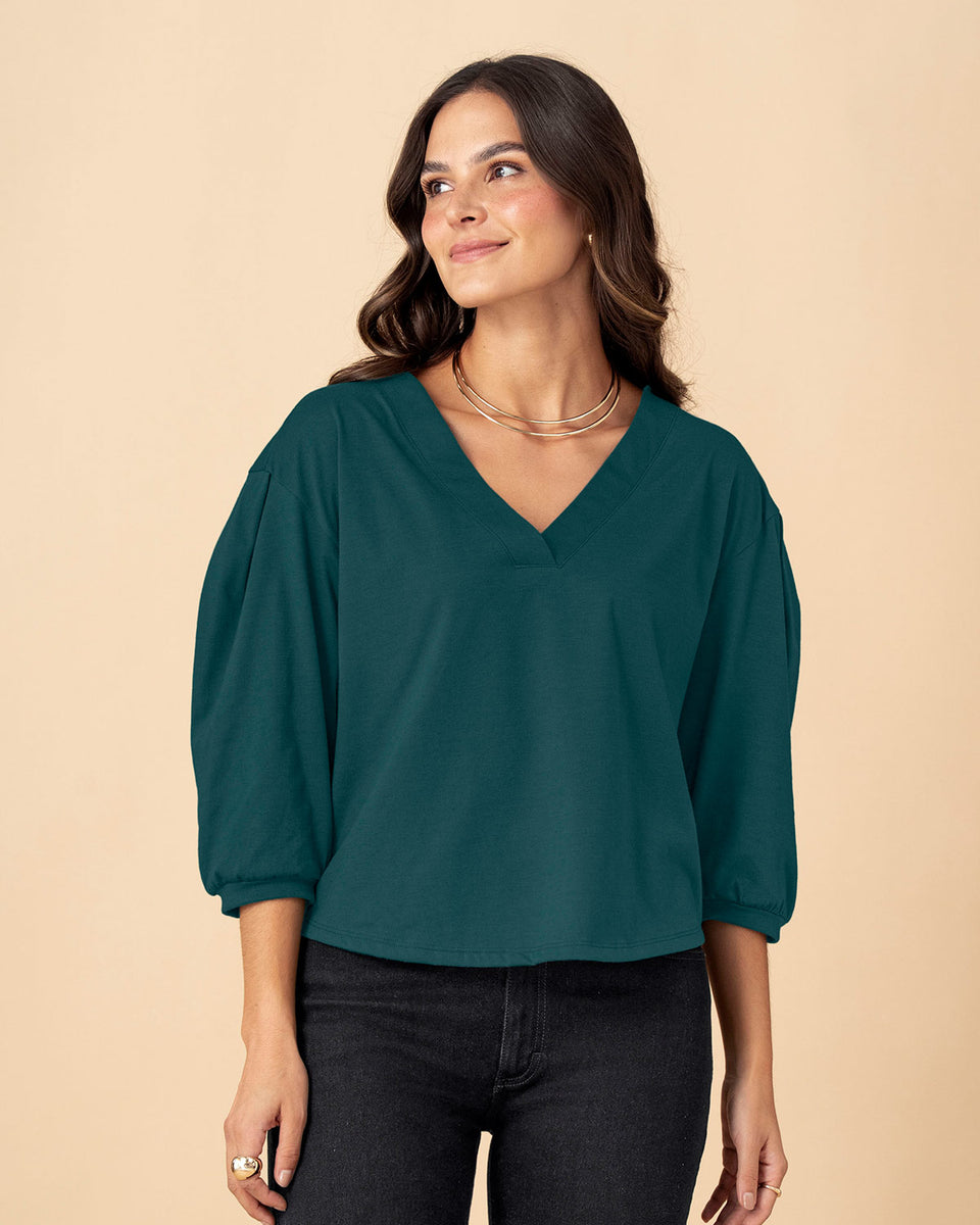 Blusa manga 3/4 tipo globo
