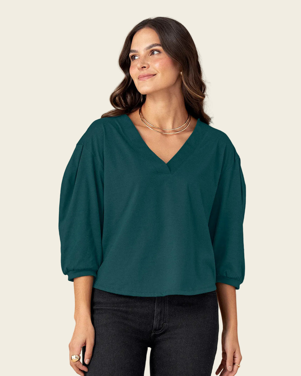 Blusa manga 3/4 tipo globo