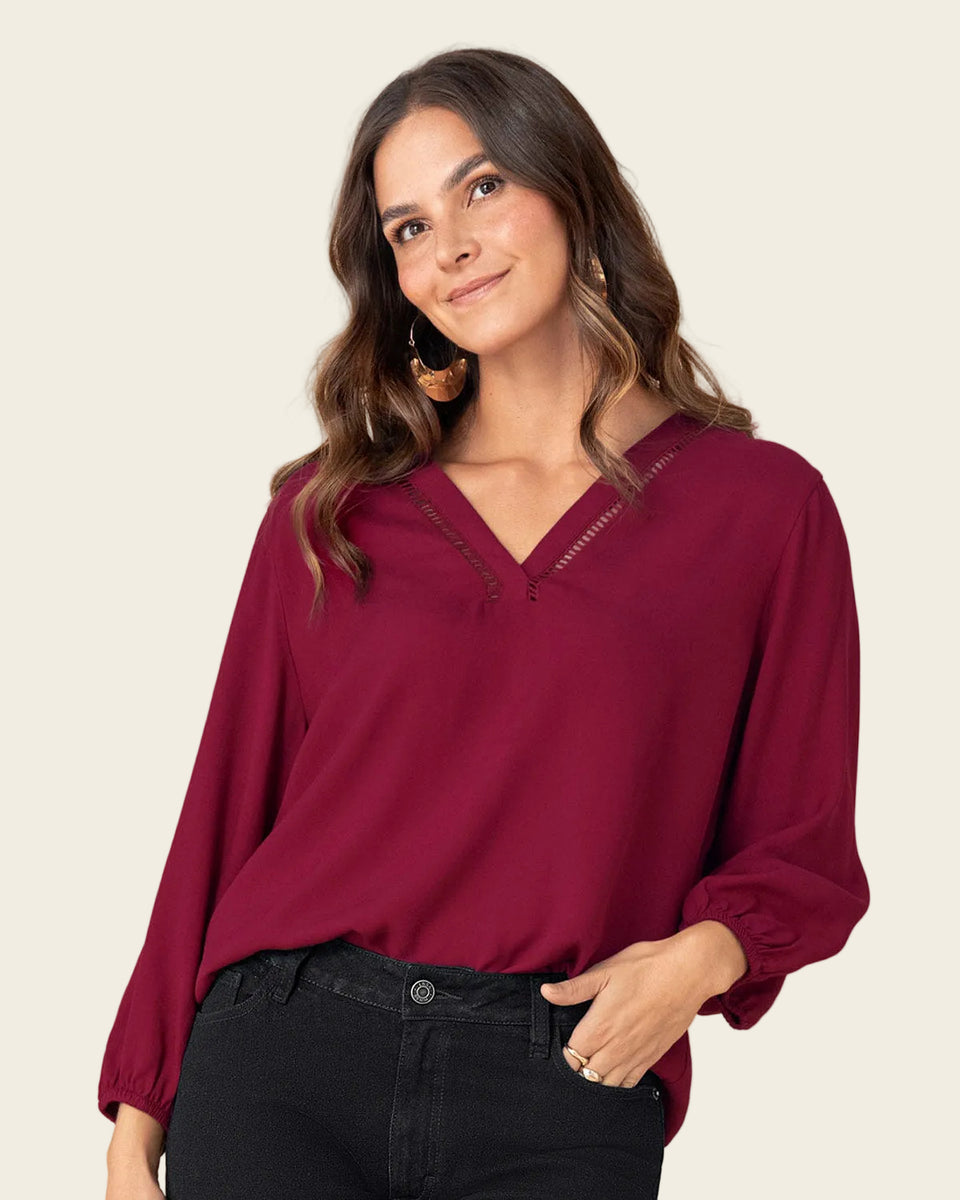 Blusa manga larga con elástico para efecto volumen