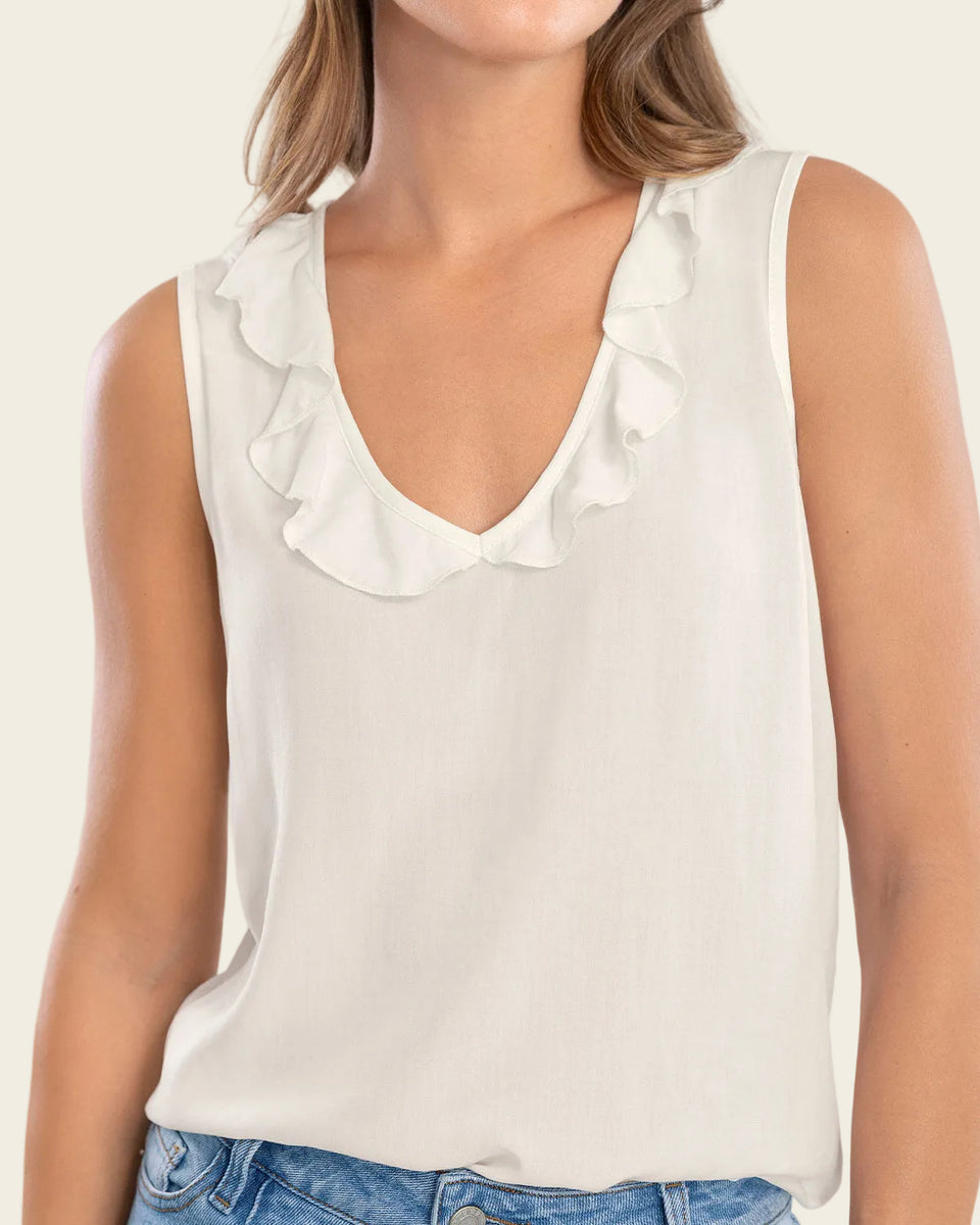 Blusa sin mangas con bolero en escote