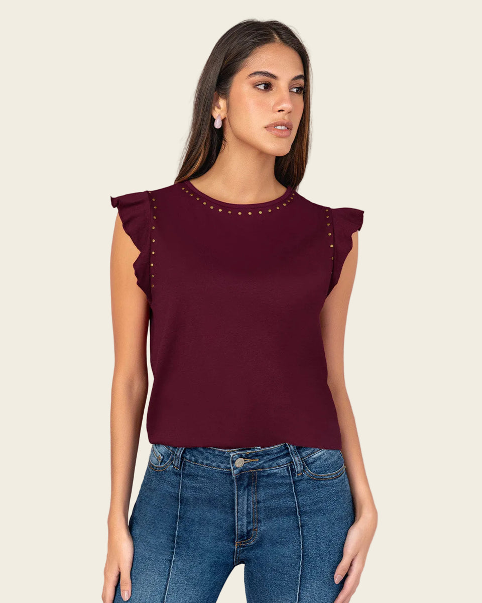 Blusa con taches en cuello y sisa