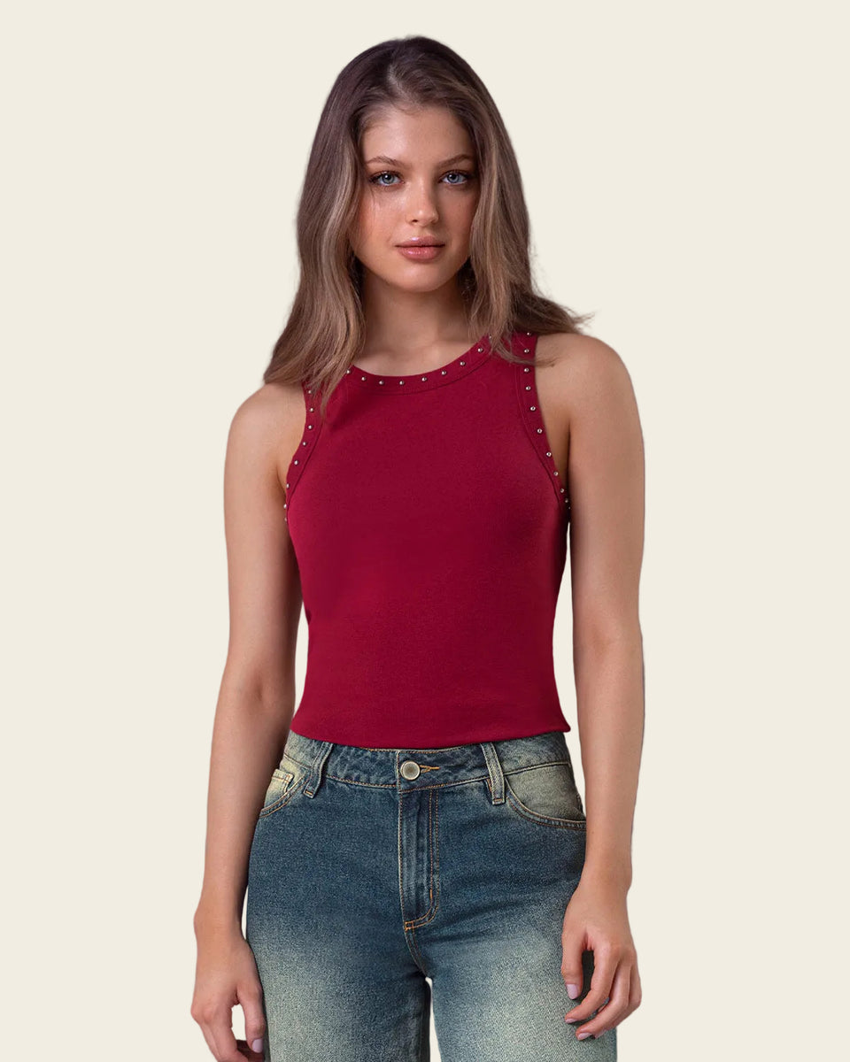 Blusa sin mangas con taches en cuello y sisa