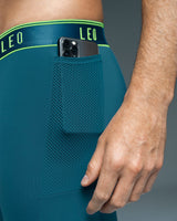 Bóxer deportivo largo con bolsillo lateral en microfibra#color_541-verde-azul