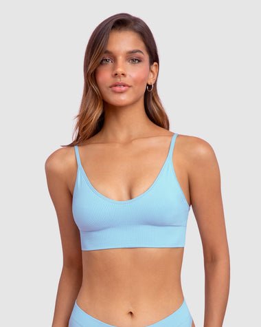 Top en tecnología seamless con textura acanalada#color_b47-azul-claro