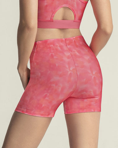 Short corto deportivo ajustado y ligero con cómodo elástico en cintura#color_040-estampado-rosa-degrade
