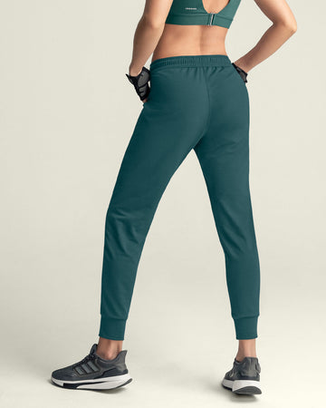 Jogger deportivo de silueta amplia con bolsillos#color_678-verde