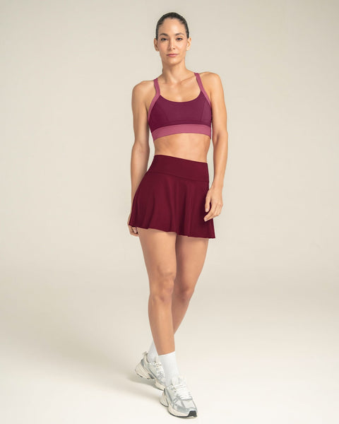 Enagua deportiva con short interno con bolsillo#color_220-vinotinto