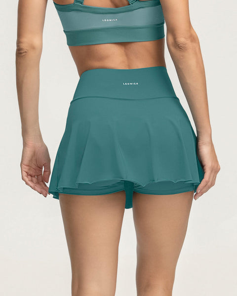 Enagua deportiva con short interno con bolsillo#color_632-verde-oscuro