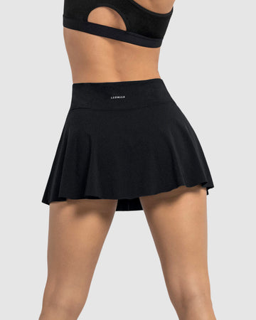 Enagua deportiva con short interno con bolsillo#color_700-negro