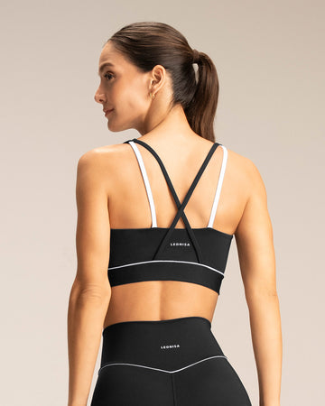 Top deportivo con cargaderas dobles#color_700-negro