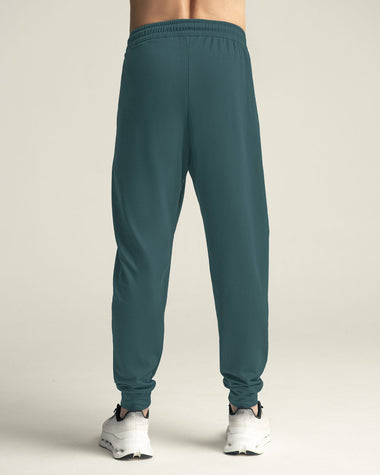 Jogger deportivo estilo sudadera con bolsillos laterales funcionales#color_678-verde