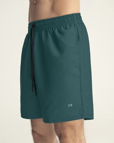 Pantaloneta deportiva con bolsillos funcionales#color_678-verde
