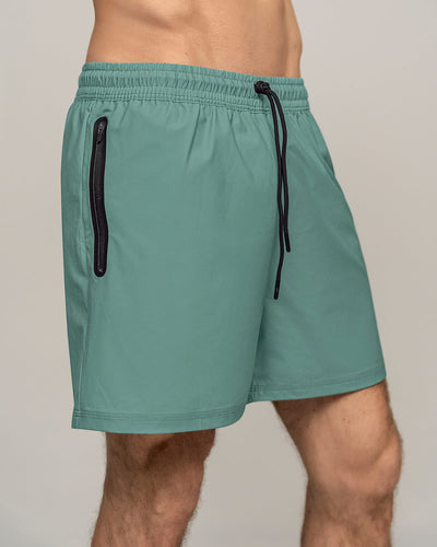 pantaloneta-deportiva-con-bolsillo-lateral-con-boxer-interno#color_644-verde