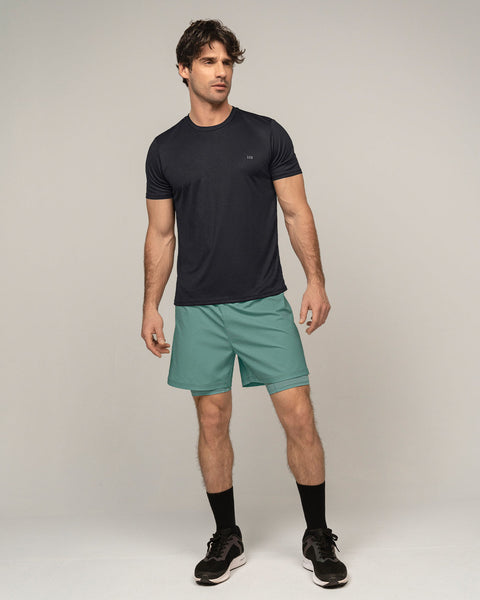 pantaloneta-deportiva-con-bolsillo-lateral-con-boxer-interno#color_644-verde