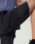 Pantaloneta deportiva con bolsillo lateral con bóxer interno