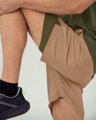 Pantaloneta deportiva con bolsillo trasero y con bóxer interno