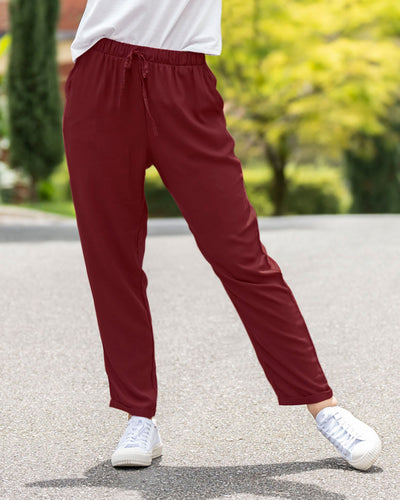 Pantalón de silueta amplia con tira anudable en cintura#color_179-terracota
