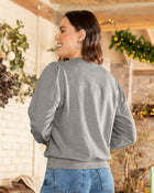 Suéter manga larga con recogido en hombros