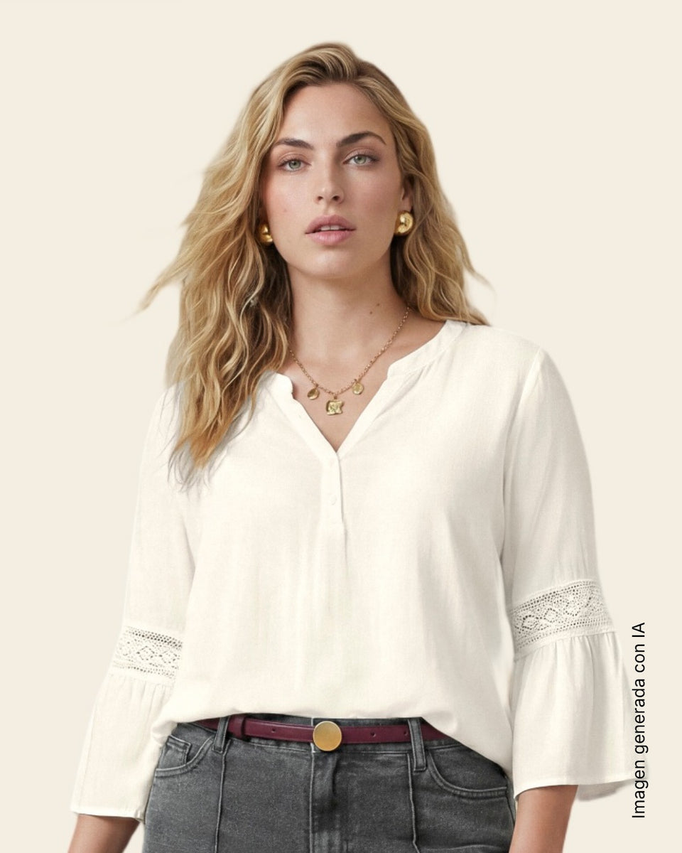 Blusa manga larga amplia con mangas tipo bolero