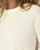 Suéter cuello redondo y mangas amplias#color_018-marfil