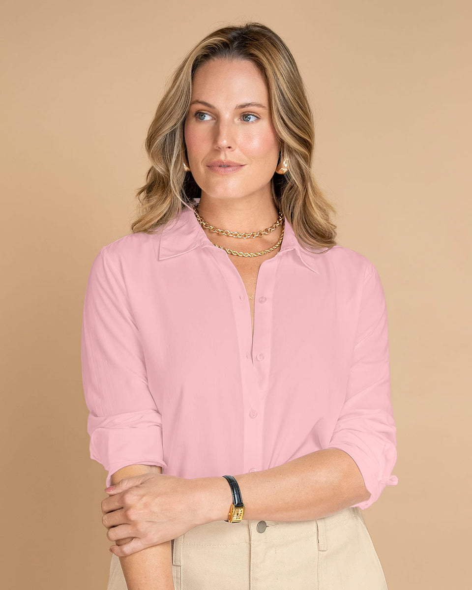 Blusa manga larga con cuello camisero y perilla funcional