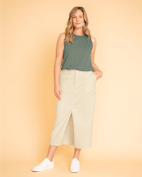 Blusa  sin  mangas básica con elástico en cintura#color_601-verde-claro