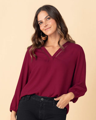 Blusa manga larga con elástico para efecto volumen#color_c33-vino