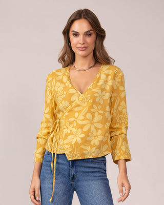 Blusa manga larga de diseño cruzado en frente#color_100-flores-amarillas