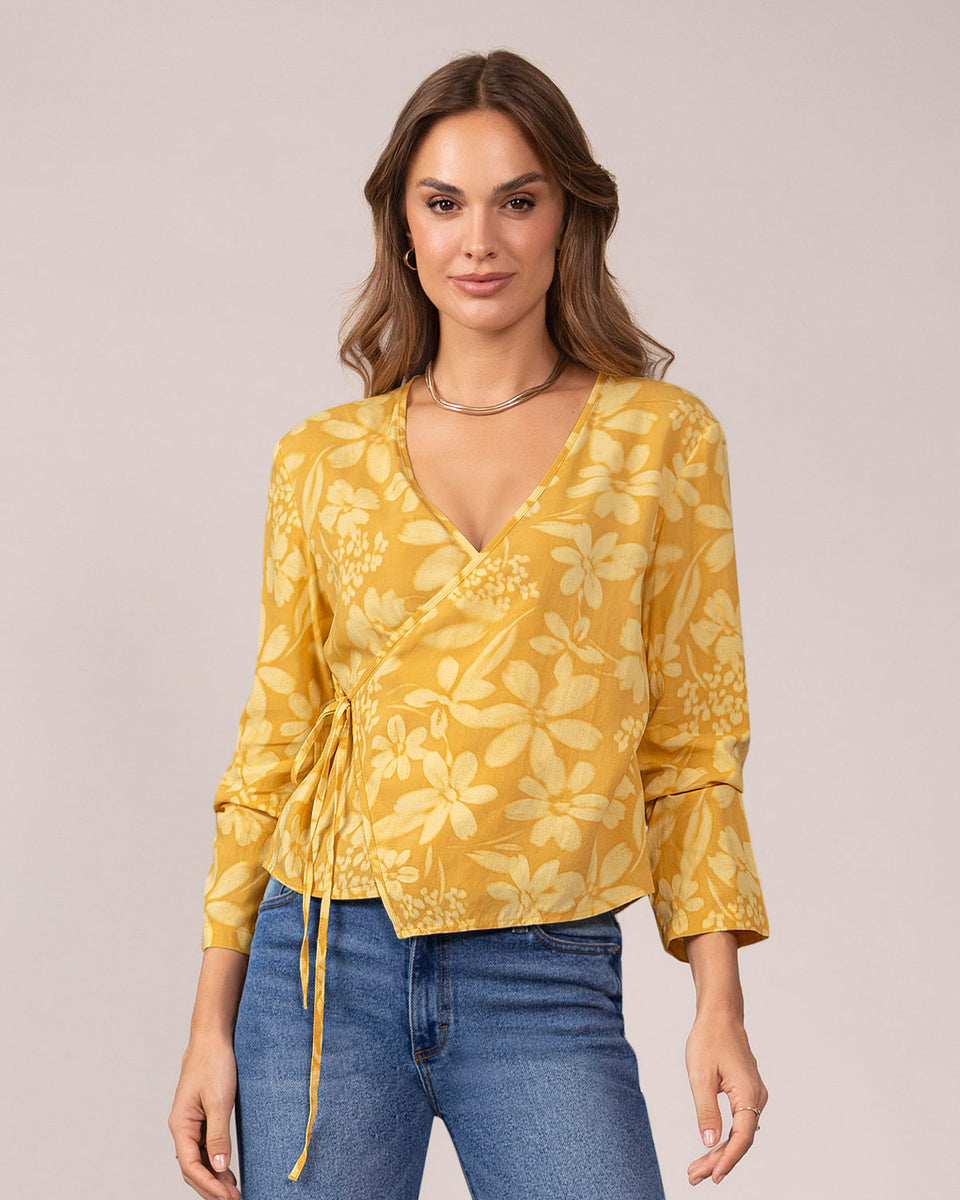 Blusa manga larga de diseño cruzado en frente