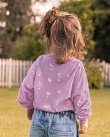 Suéter manga larga con cuello redondo de niña#color_043-fondo-lila