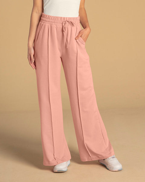 Pantalón tipo jogger con ruedo ancho#color_180-palo-rosa