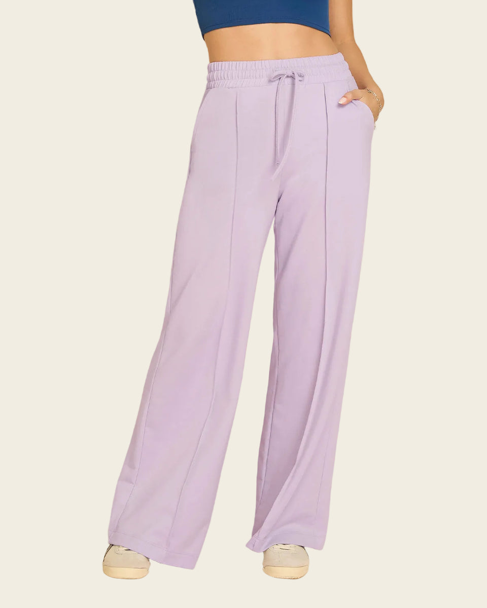 Pantalón tipo jogger con ruedo ancho