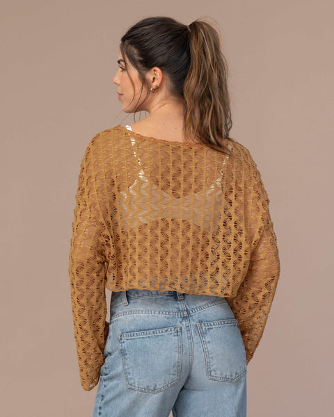 Blusa crop manga larga con transparencias#color_a89-terracota