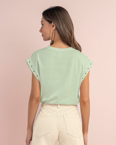 Blusa con taches en cuello y mangas#color_172-verde-pastel