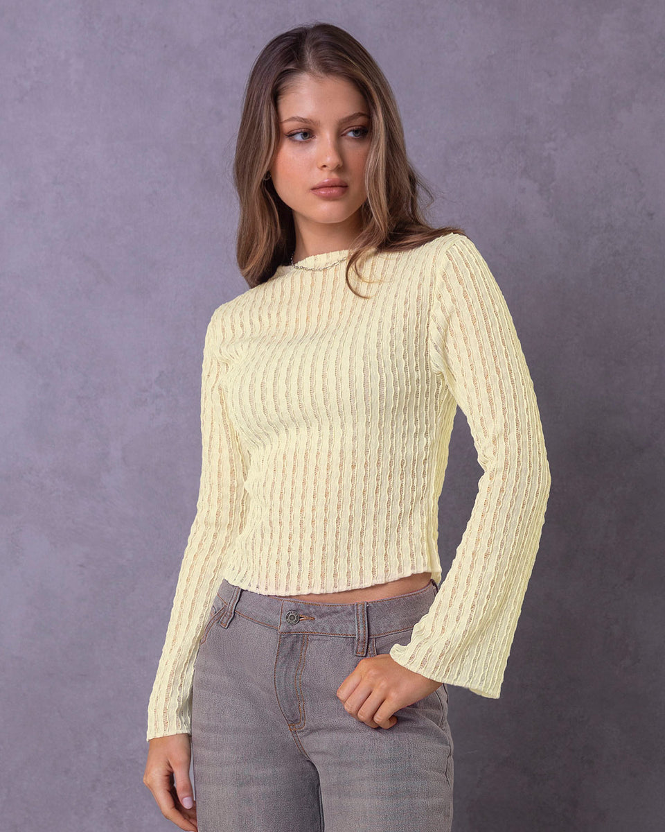 Blusa manga larga cuello redondo alto en tela con textura