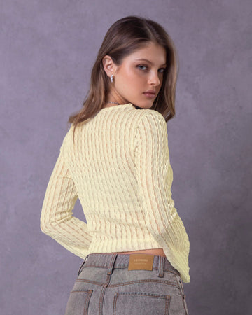 Blusa manga larga cuello redondo alto en tela con textura#color_018-marfil