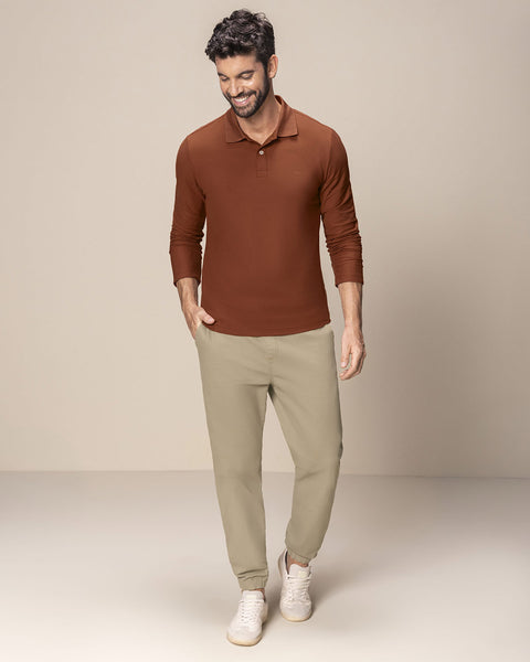 Camiseta tipo polo manga larga con logo bordado en frente#color_174-rojo-ladrillo