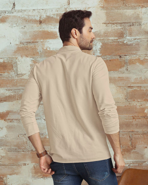 Camiseta tipo polo manga larga con logo bordado en frente#color_606-arena