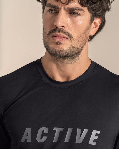 Camiseta deportiva de tacto suave con acabado antibacterial#color_700-negro