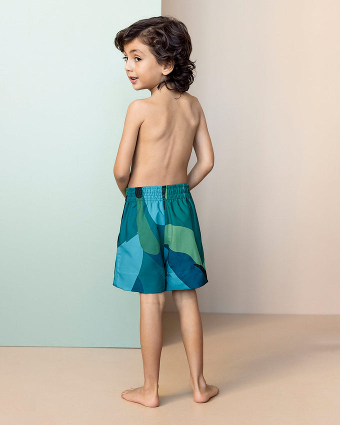 Pantaloneta de baño para niño con bolsillo lateral#color_085-estampado-abstracto