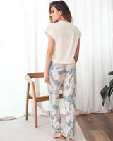 Pantalón largo con elástico en cintura y ruedo#color_145-estampado-azul-claro