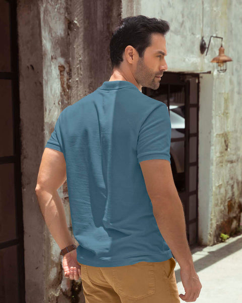 Blusa tipo polo con bordado en frente#color_294-azul